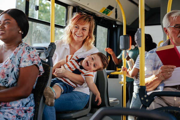 Mom with son on the bus