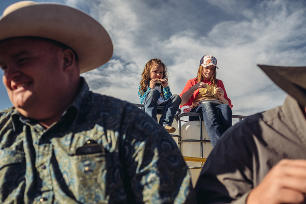 Farmer and children on a tractor