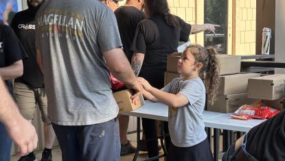 Father and Daughter at a food distribution